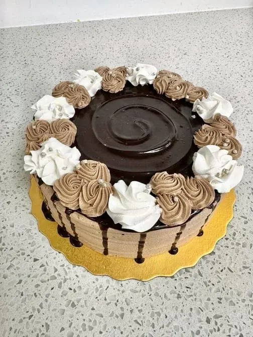 Eggless custom birthday cakes at Manohar Vegetarian Bakery in Edmonton, AB